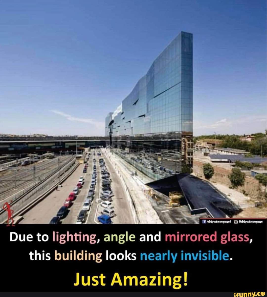 Due to lighting, angle and mirrored glass, this building looks nearly ...