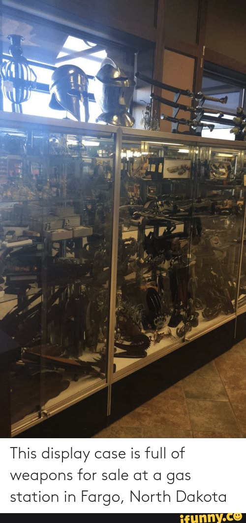 This display case is full of weapons for sale at a gas station in Fargo