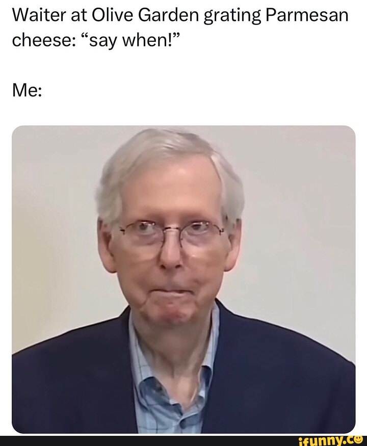 Waiter at Olive Garden grating Parmesan cheese "say when!" Me